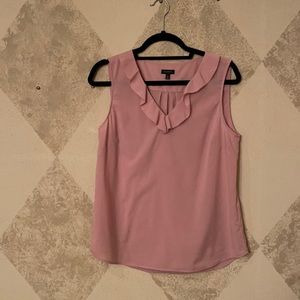 Romantic, beautiful, sleeveless blouse.